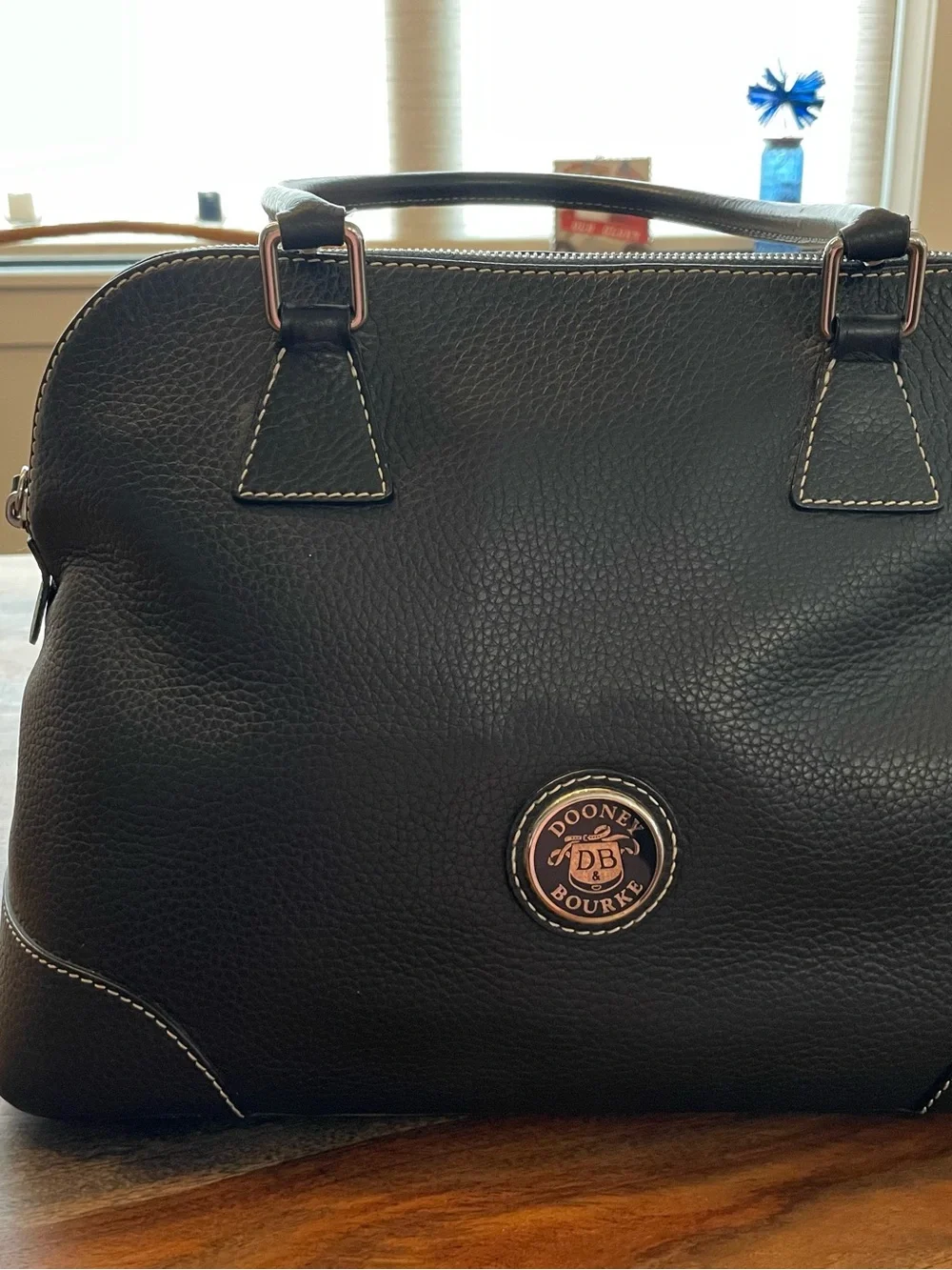 Dooney & Bourke Black Pebbled Leather Satchel with Logo Emblem